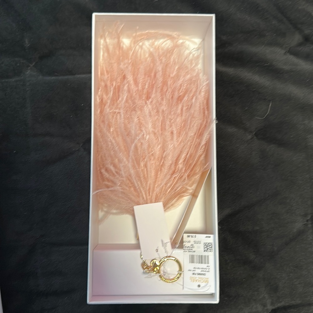 Michael Kors feather keychain Pom